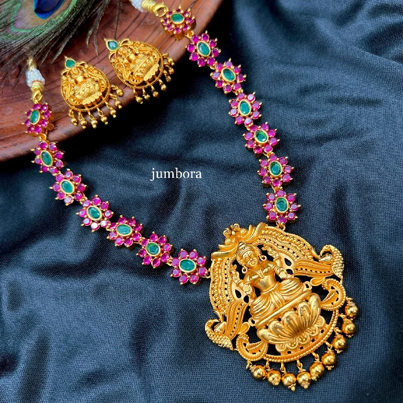 women's rose gold necklaces-Temple Jewelry Nakshi Gold Ruby Emerald AD Lakshmi Necklace Set