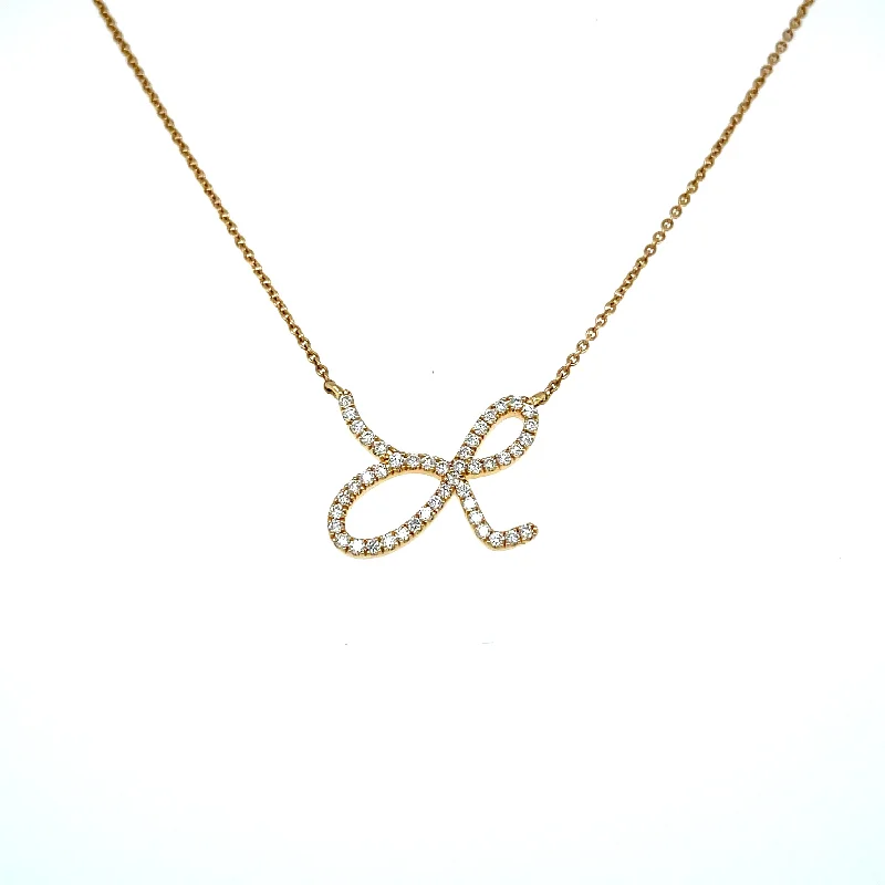 women's winter necklaces-18KY gold initial "L" necklace with .23 cts diamonds