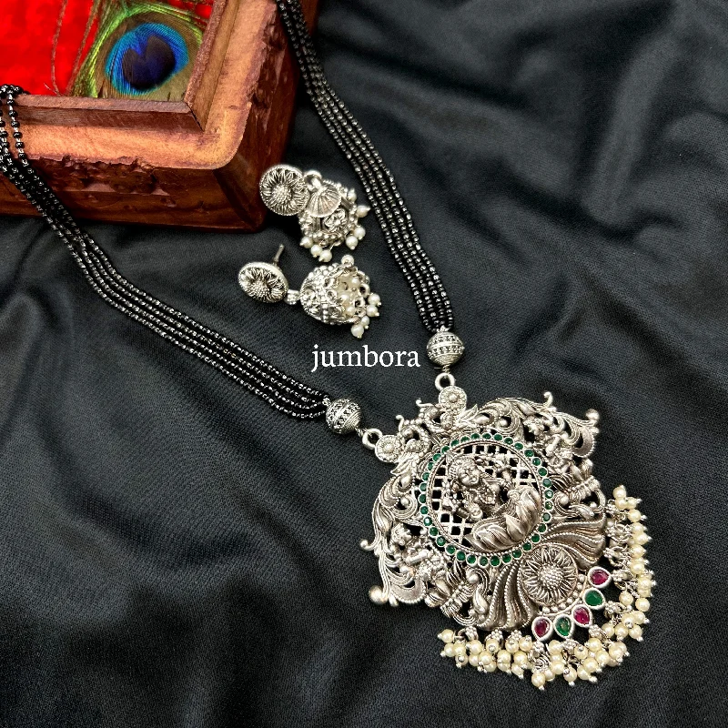 women's crystal necklaces-Lakshmi Black Mangalsutra Oxidized Silver Necklace Set