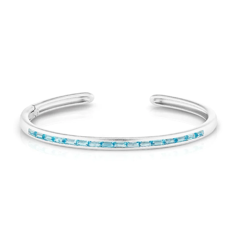 women's religious bracelets-Slim Hinged Oval Cuff Bracelet with Blue Topaz Baguettes